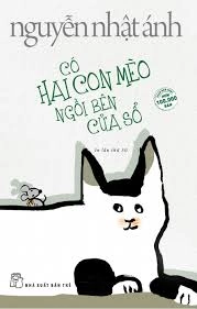 Có hai con mèo ngồi bên cửa sổ
